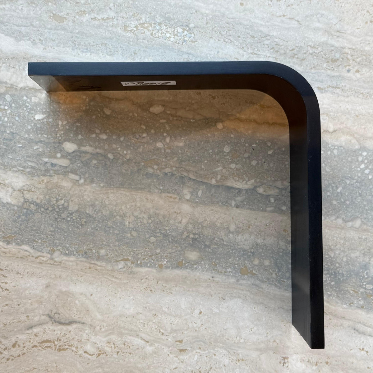 Black R50 10cm external corner skirting accessory by BEACON, designed for wall panels and profiles, used in interior finishing.