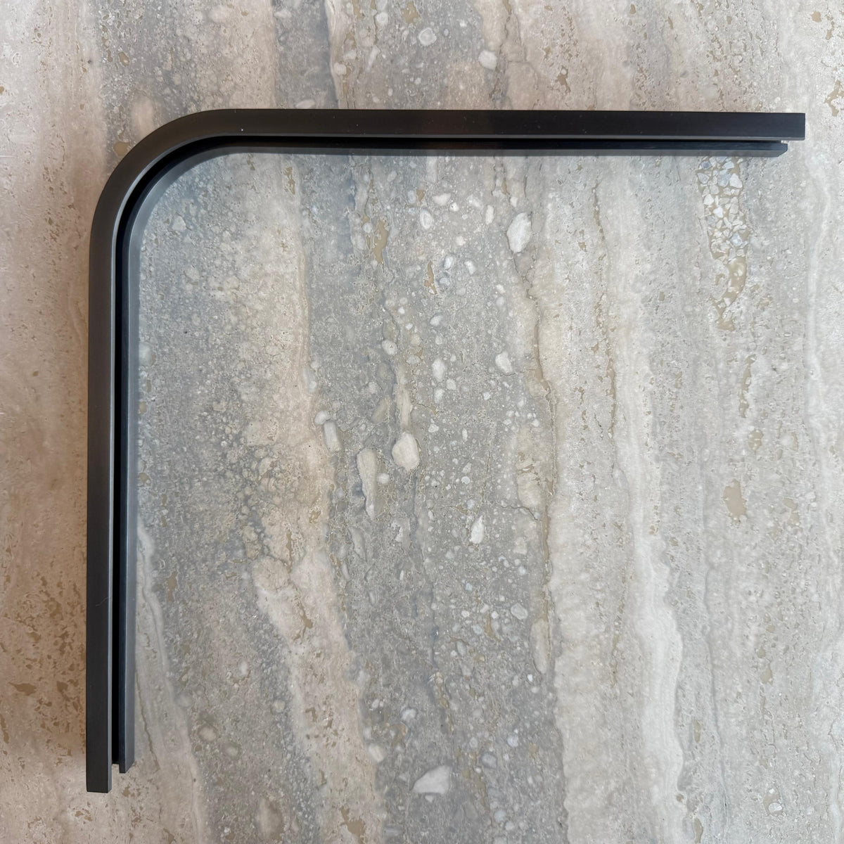 Black R50 2.5cm curved internal right corner wall panel accessory by BEACON for seamless corner finishing.
