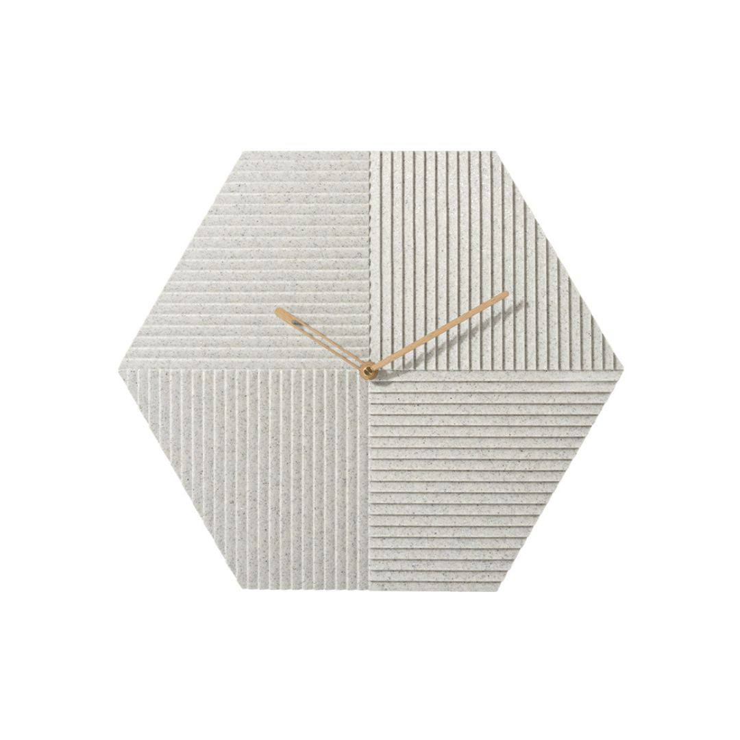 Sahara Hexagon Wall Clock by BEACON, featuring a modern geometric design with a sleek hexagon shape and minimalist clock face.