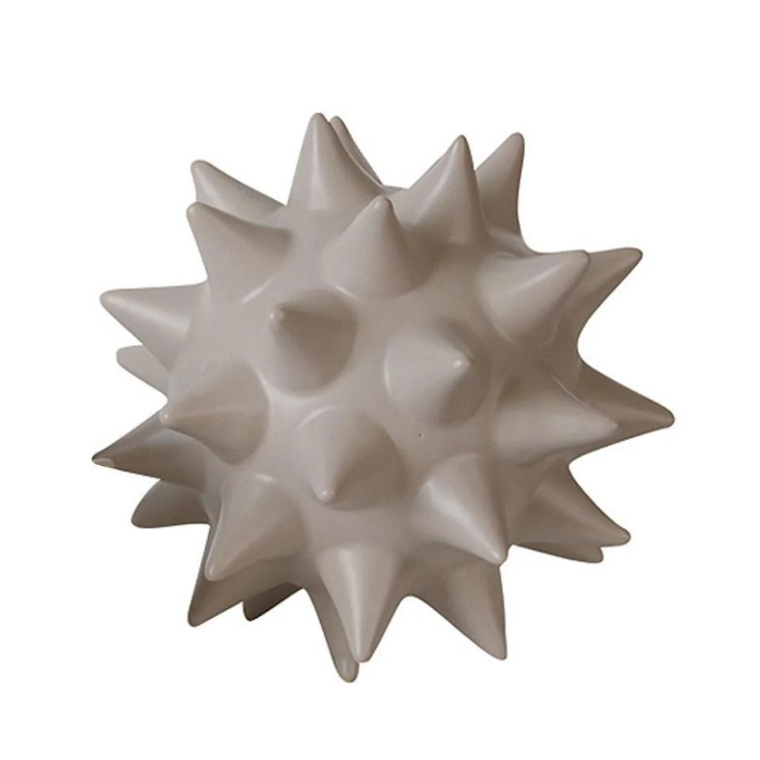 Ceramic Sea Urchin Ball decorative figurine by BEACON, home decor accent with intricate sea urchin design.
