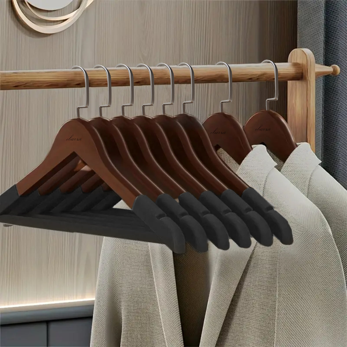 Set of 3 maple wood coat hangers by BEACON, featuring natural finish and sturdy design for clothing organization.