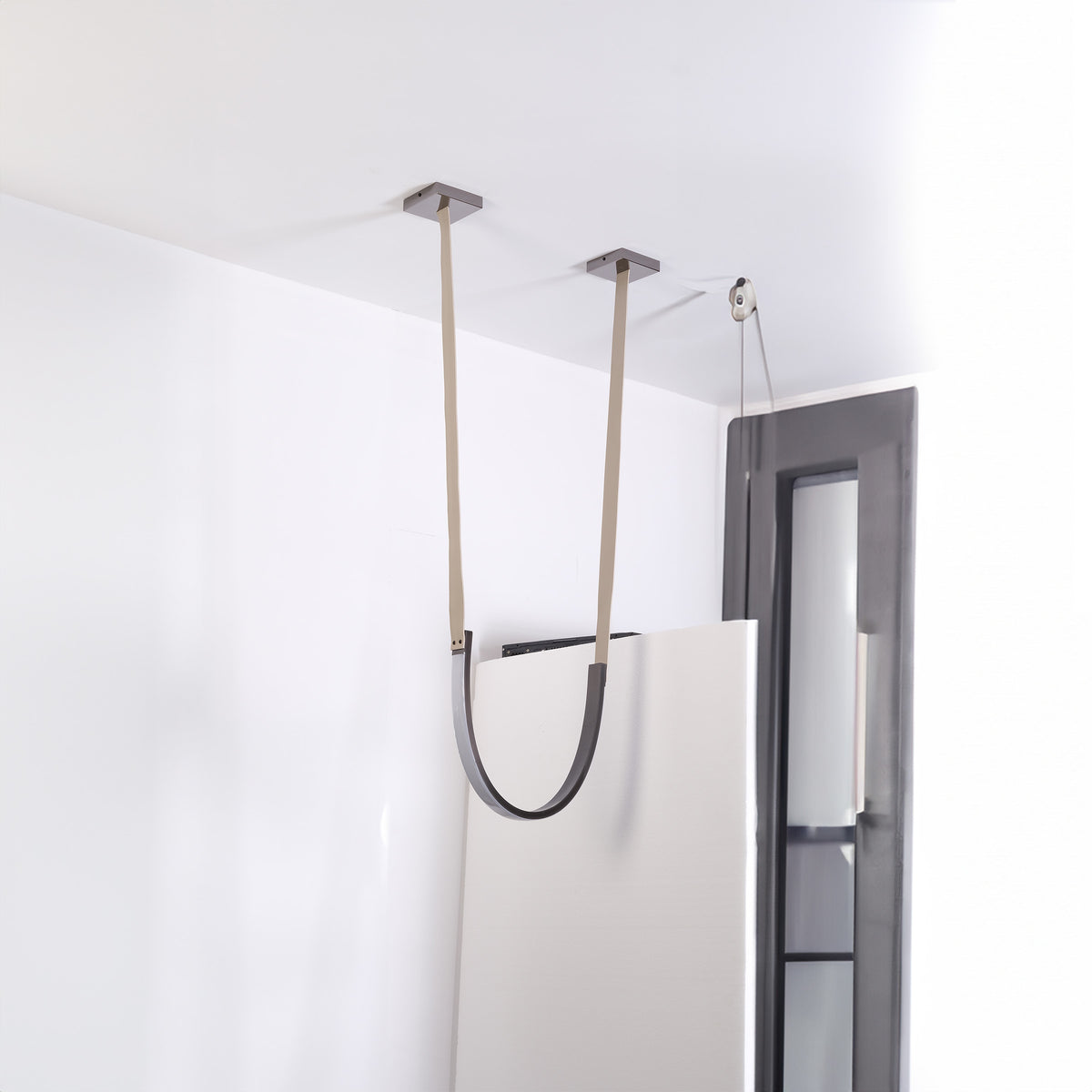 Set of 3 BEACON leather curve pendant lamps with elegant catenary design, showcasing modern lighting fixtures.