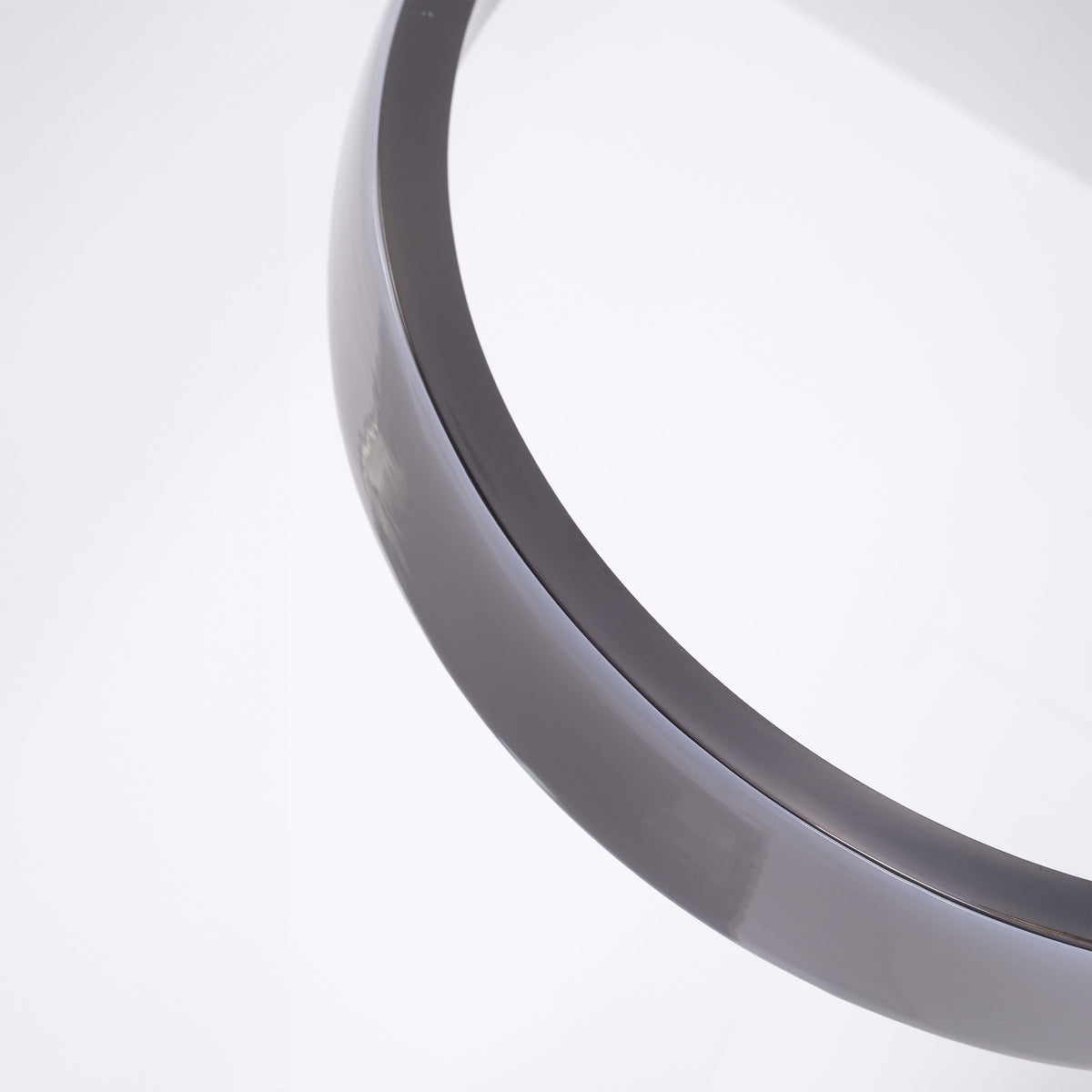 Set of three BEACON leather curve pendant lamps with sleek, modern design and curved leather detailing.