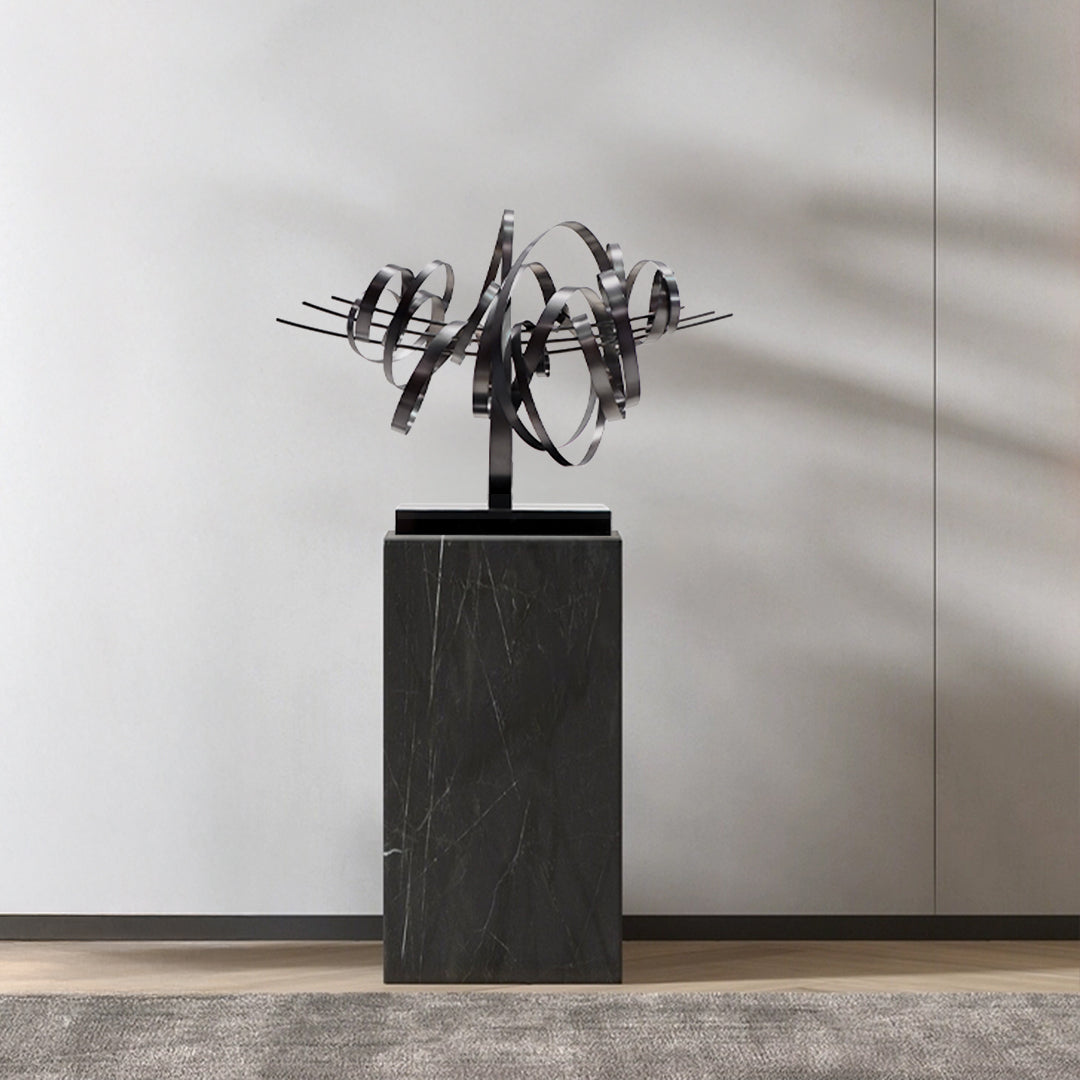 Handcrafted stainless steel shock wave artwork by BEACON, showcasing intricate design and polished metal finish.