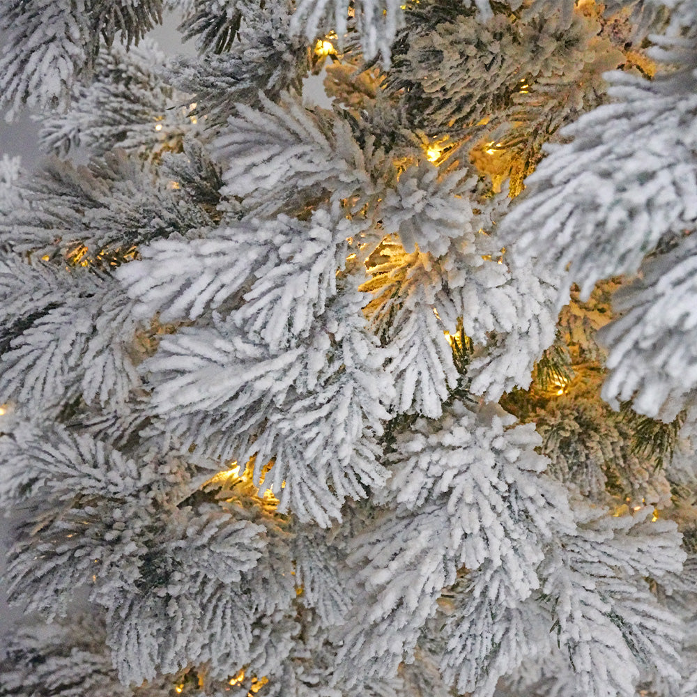 Snow Christmas Tree with LED lights, 170cm tall, by BEACON, featuring realistic snow-covered branches for festive holiday decor.