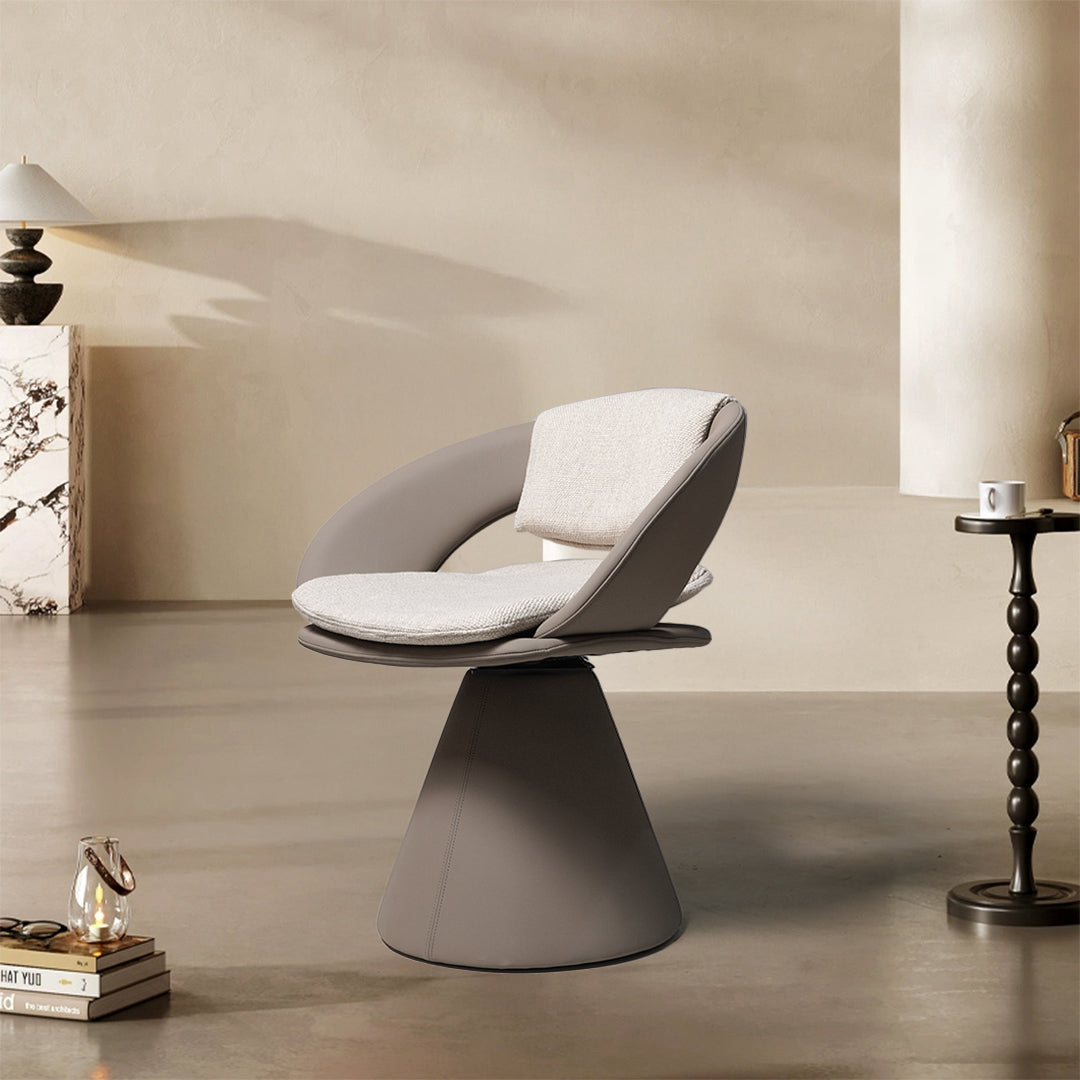Soren swivel dining chair by BEACON with padded seat and backrest, modern design, in a cozy dining room setting.