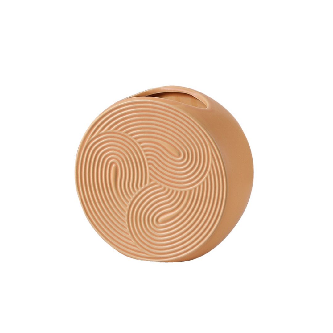 Spiral pattern ceramic vase by BEACON, beige with intricate spiral design, ideal for floral arrangements and home decor.
