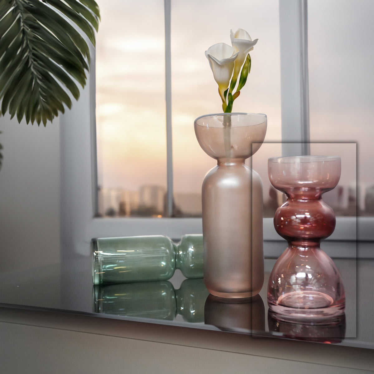 Sprayed brown ceramic vase from BEACON, 23F117B, with a smooth, rounded shape and matte finish, ideal for decorative displays.