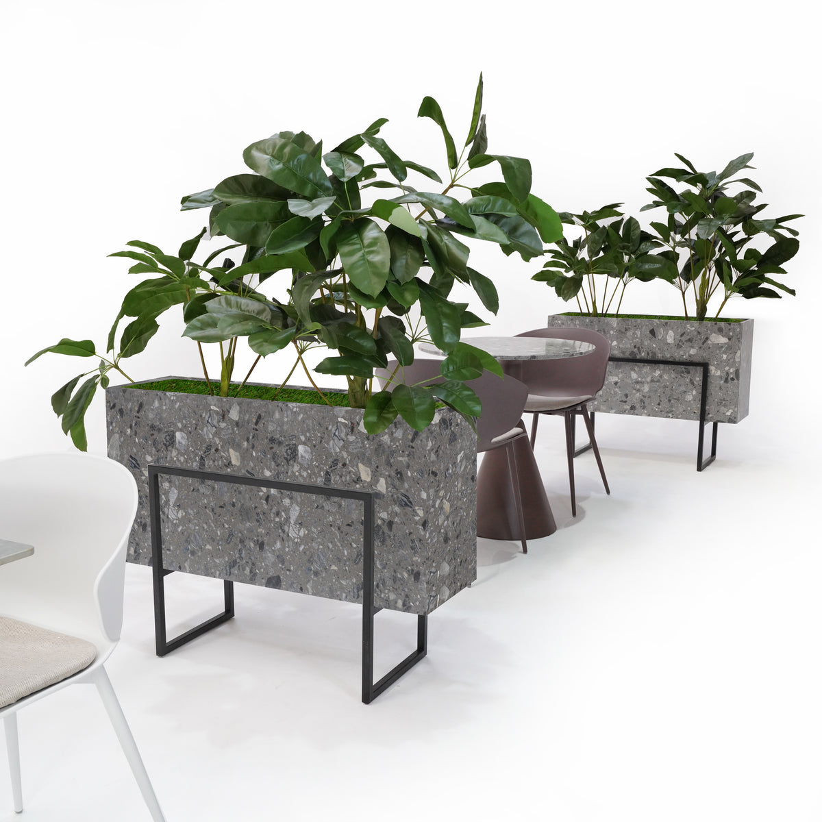 Terrazzo planter box from BEACON with a modern, speckled surface, designed for indoor or outdoor use.
