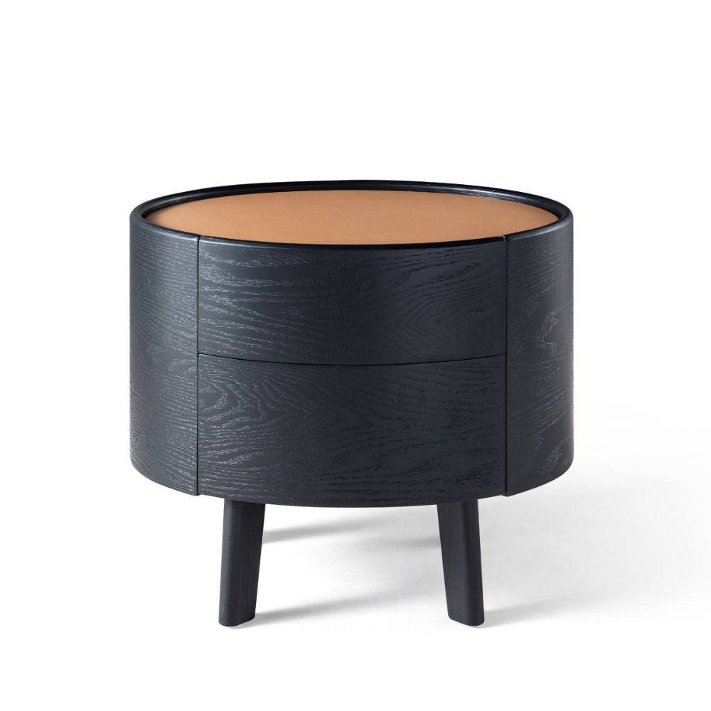 Toffee-colored bedside table display item by Beacon, featuring a sleek design and compact storage for bedroom decor.