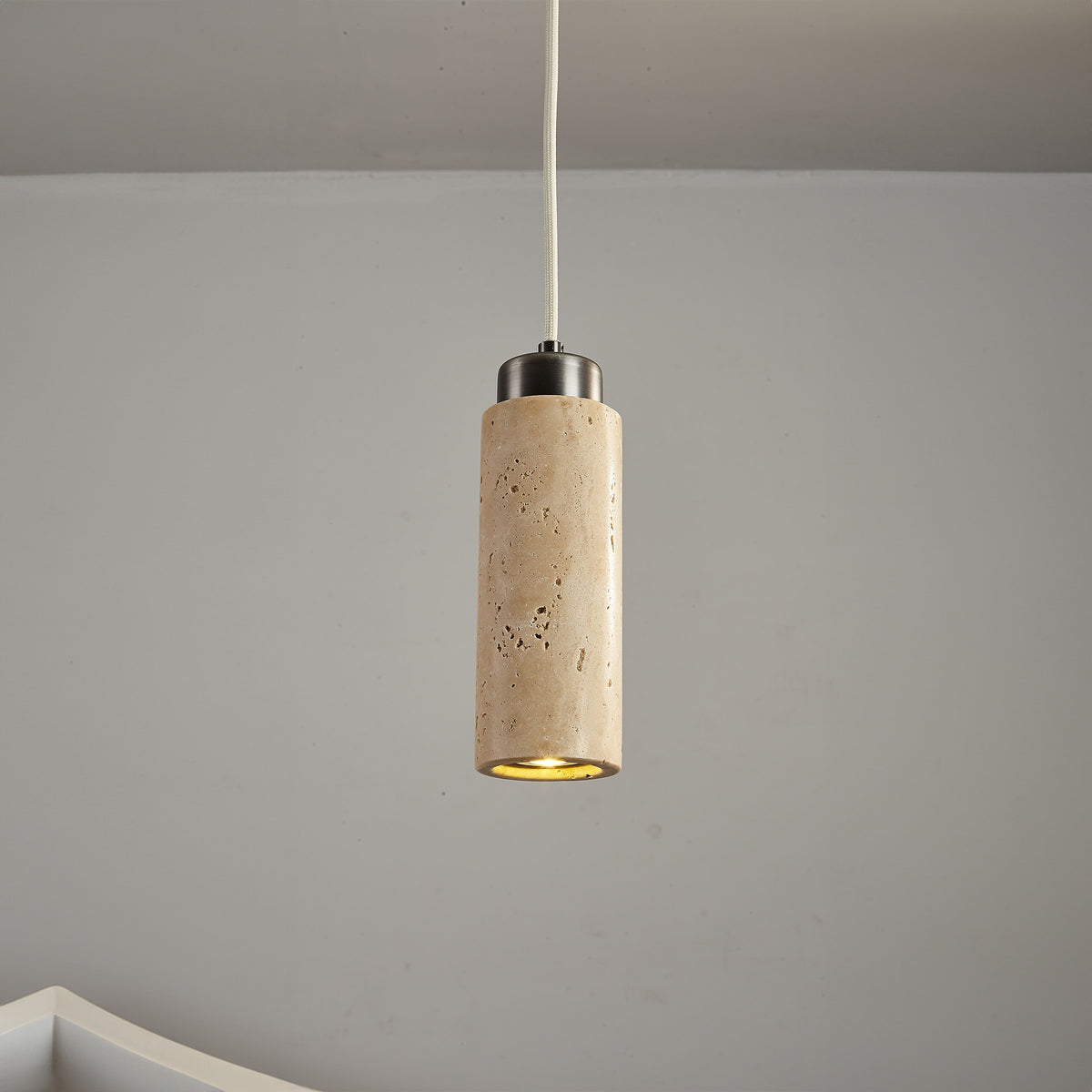 BEACON JIADG travertine pendant lamp 60005-1P with elegant stone-textured shade hanging from ceiling in modern interior