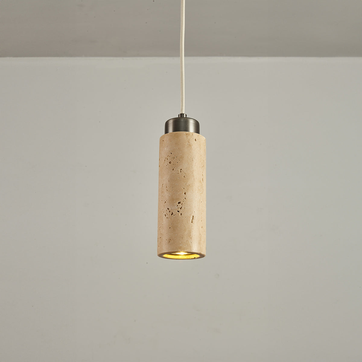 Beige travertine pendant lamp by BEACON/JIADG, modern ceiling light with stone-textured shade for stylish interior lighting.