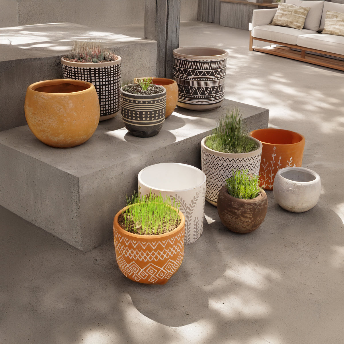 Triangular terracotta outdoor and indoor planter box by BEACON, perfect for plants and decorative garden displays.