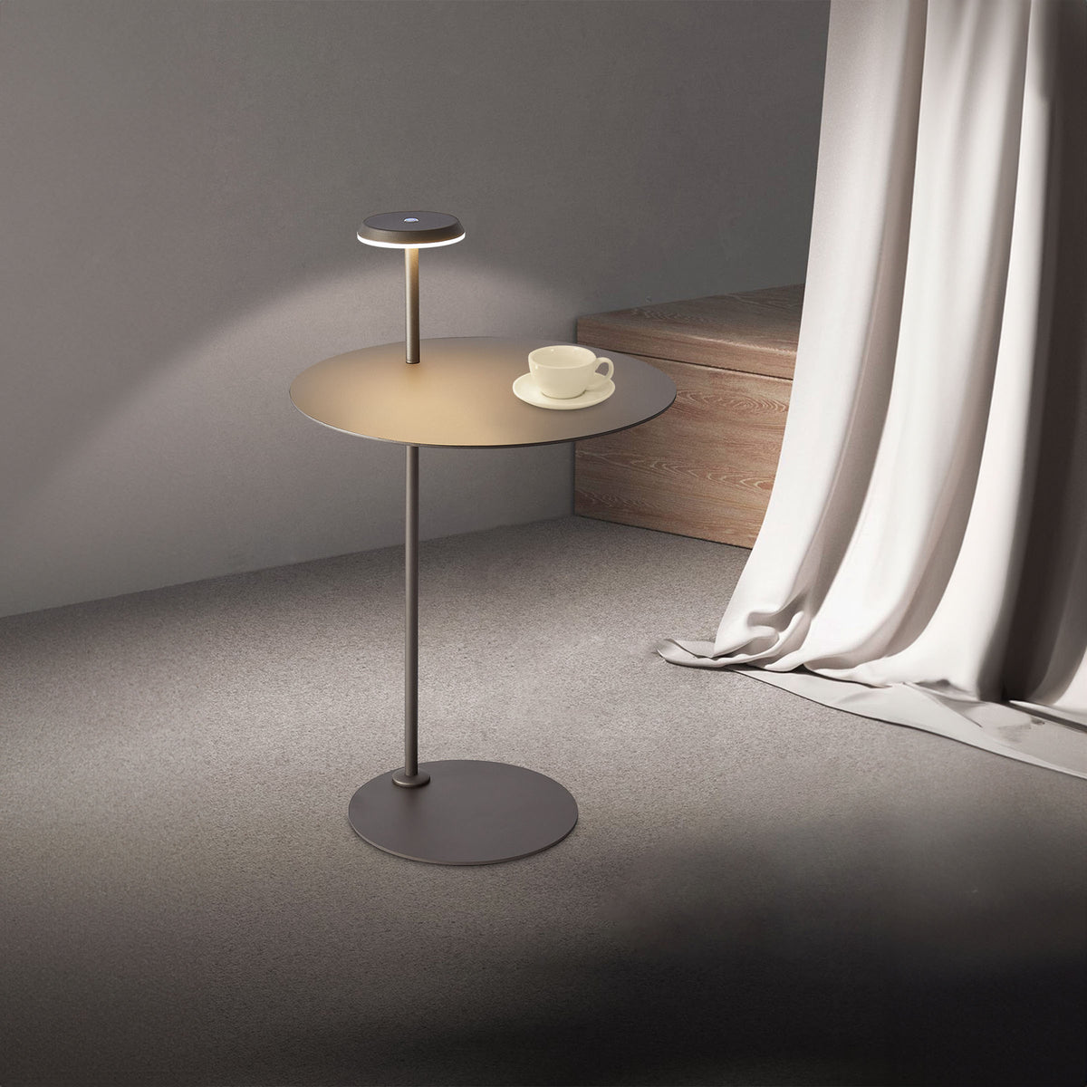 Beacon Twilight Tabletop Floor Lamp with side table, modern design, beige finish, and sleek cylindrical shape.