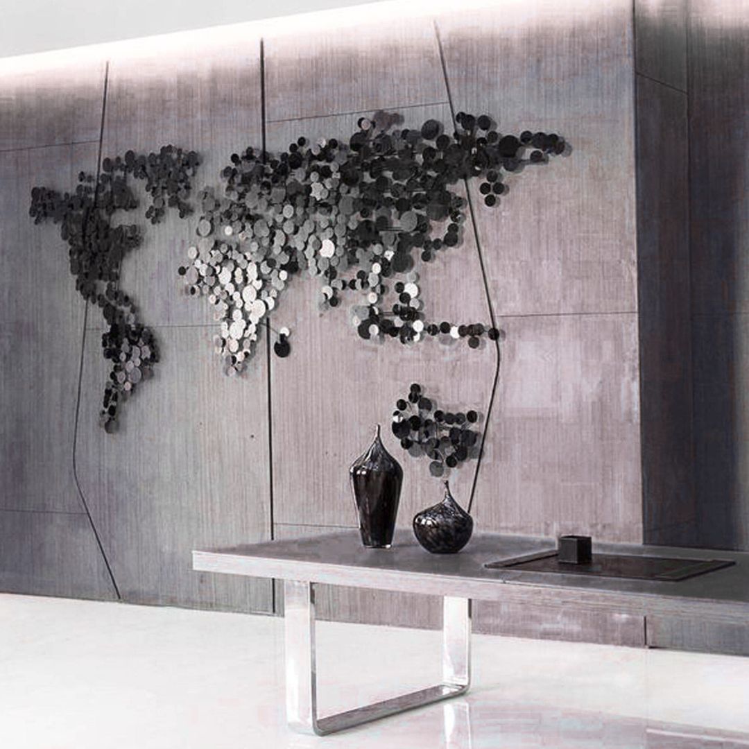 Handcrafted stainless steel world map artwork by BEACON in Gun Black finish, showcasing detailed continents and modern design.