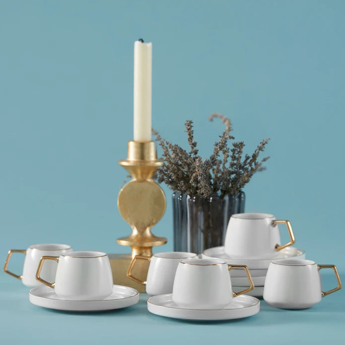 Saturn 6-seater porcelain coffee cup set by KARACA and KARACA HOME, featuring elegant cups arranged on a wooden table.