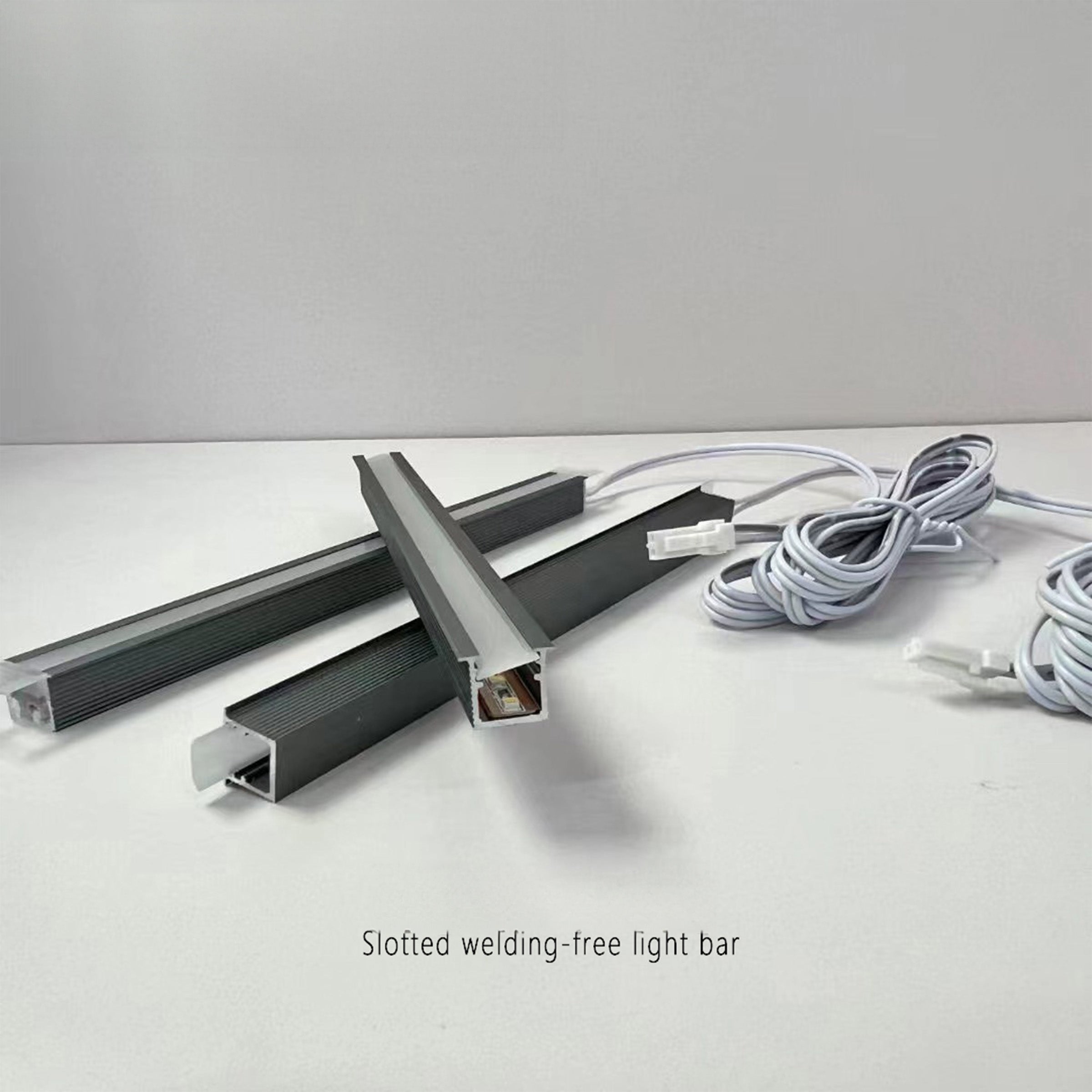 Gray aluminum profile with LED, 0.4mm thick, 1.1cm wide, for wall panels, by BEACON, model CH4-AL107.