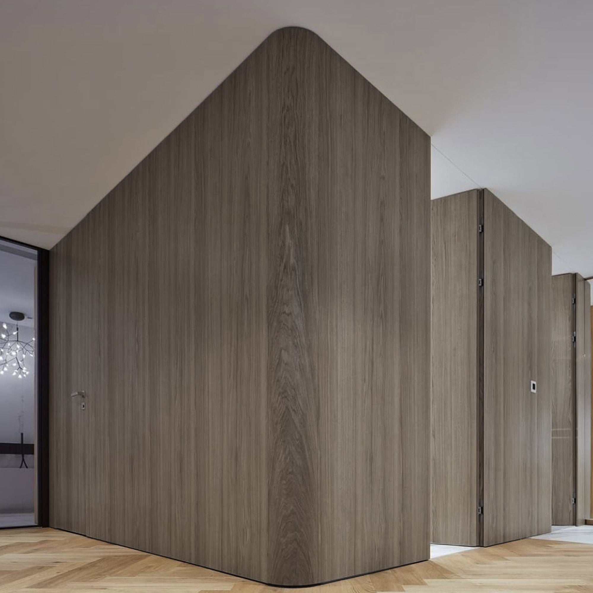 Sample of BEACON WPC slat wall panel in Manhattan Grey Oak with 4-sided wrap, 350x24cm, showcasing grey oak wood texture.
