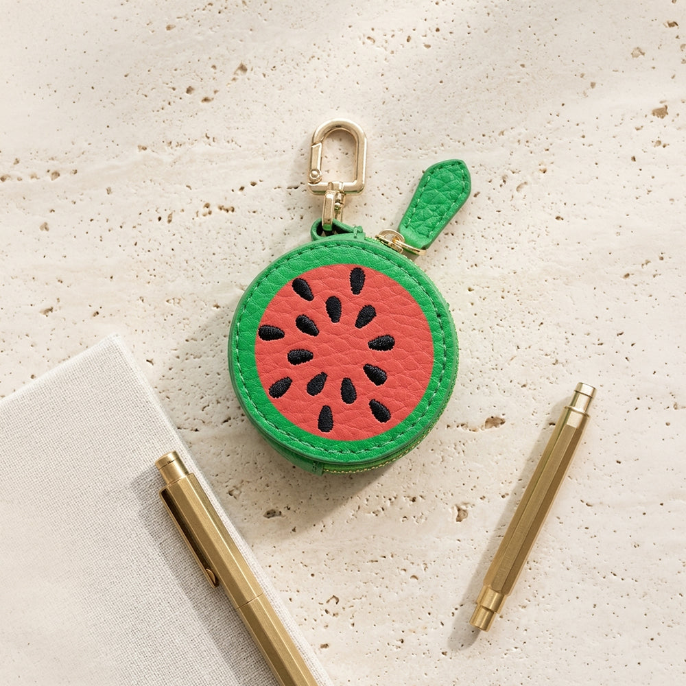 BEACON Keychain 012 with engraved design, made of durable material, featuring the brand logo and keyring attachment.