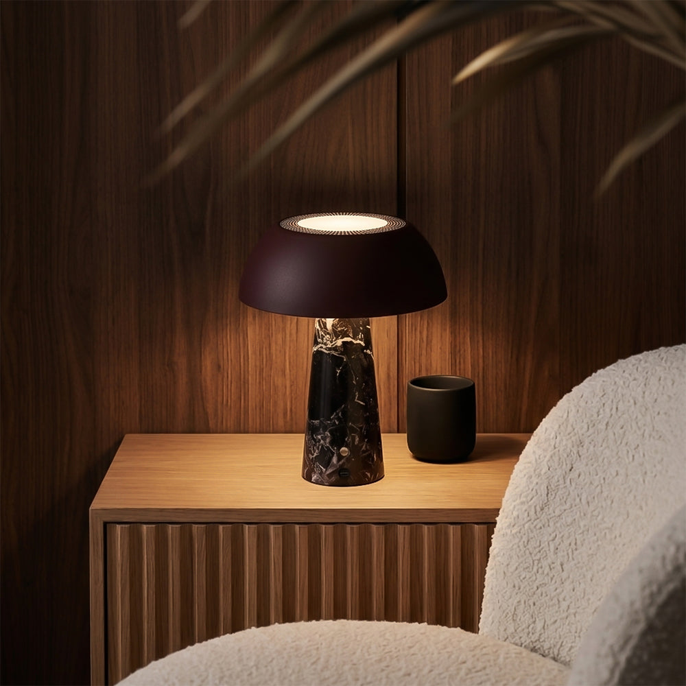 BEACON Solis Table Lamp with modern design, black finish, and adjustable arm for stylish desk lighting.