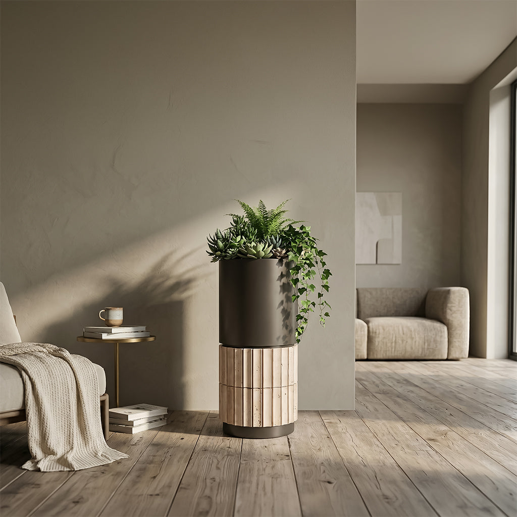 Urban Terra cylinder planter box by ebarza, showing a sleek, modern outdoor garden container with a smooth finish.