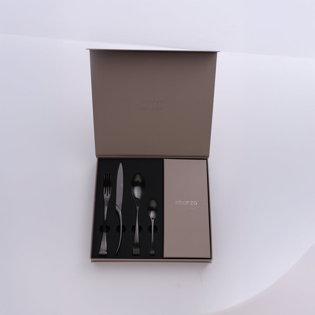 24-piece Noble Cutlery Set by BEACON featuring stainless steel knives, forks, and spoons arranged on a dining table.