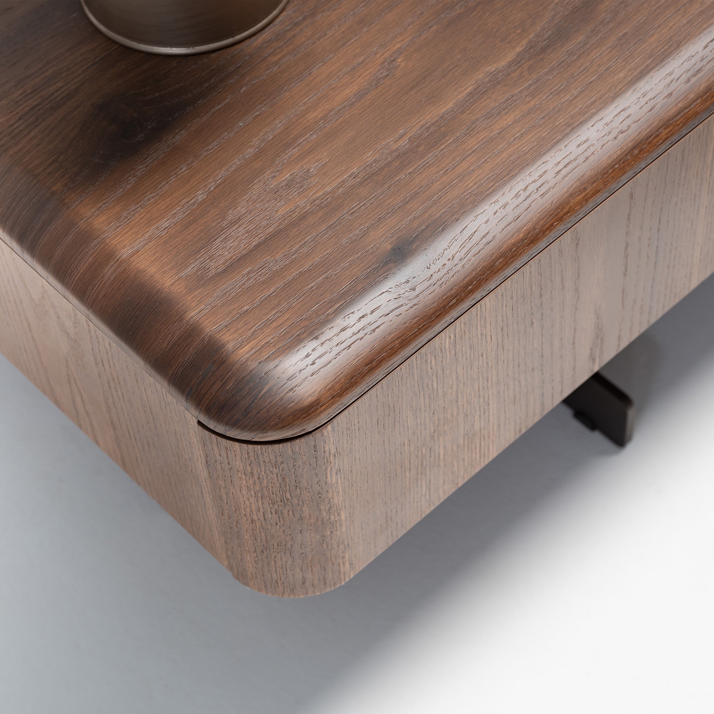 Two HOMAGE KOLTUK Odeon Nightstands OD-NS-001 bed side tables with sleek modern design, featuring smooth surfaces and storage drawers.