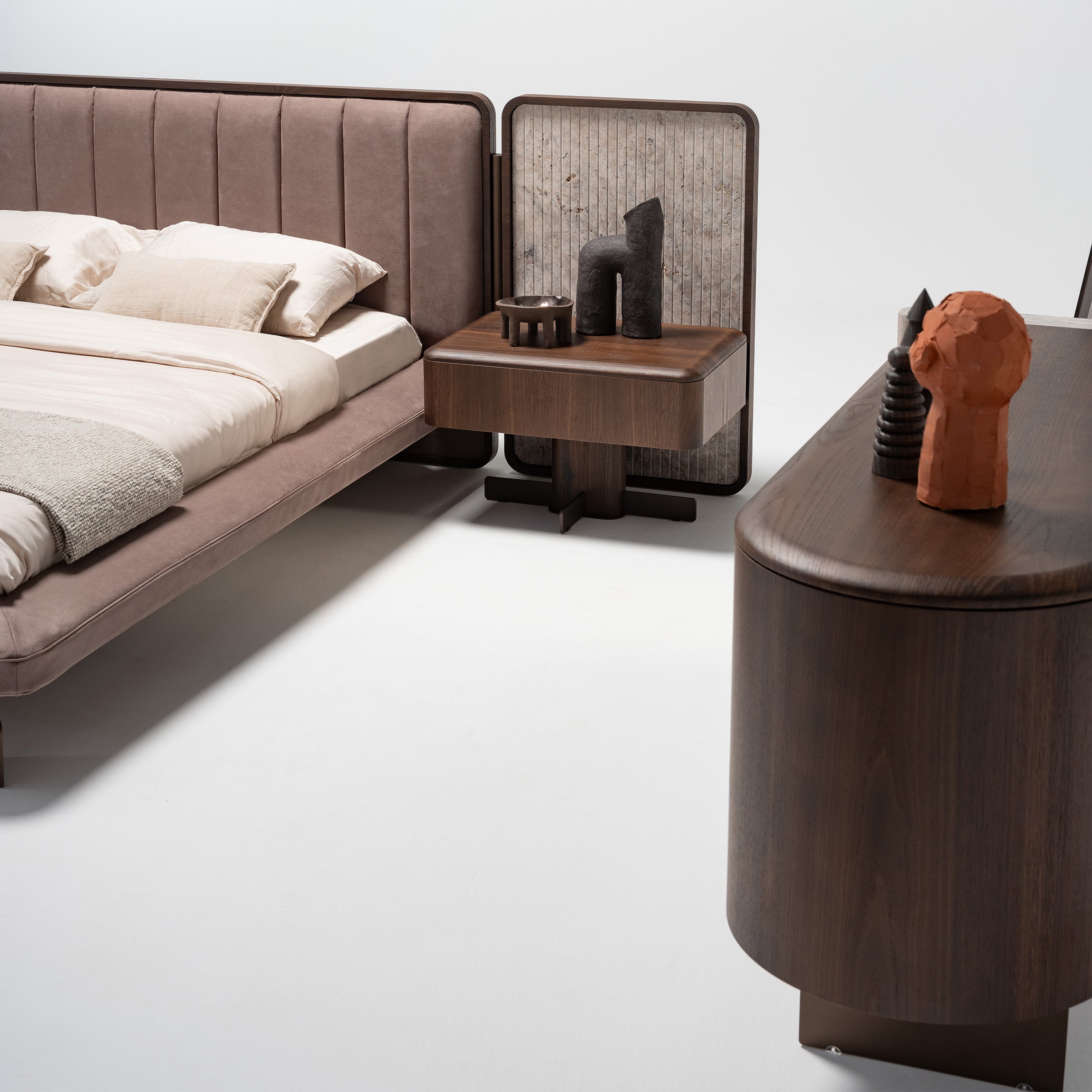 Two HOMAGE KOLTUK Odeon Nightstand OD-NS-001 bedside tables with modern design, featuring drawers and a smooth surface.