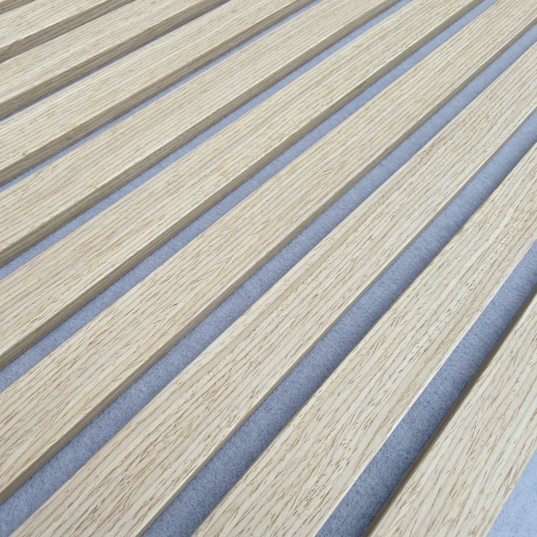 Light grey BEACON 300x60x2.1cm slat acoustic wall panel with fire retardant white oak finish, decorative and sound-absorbing.