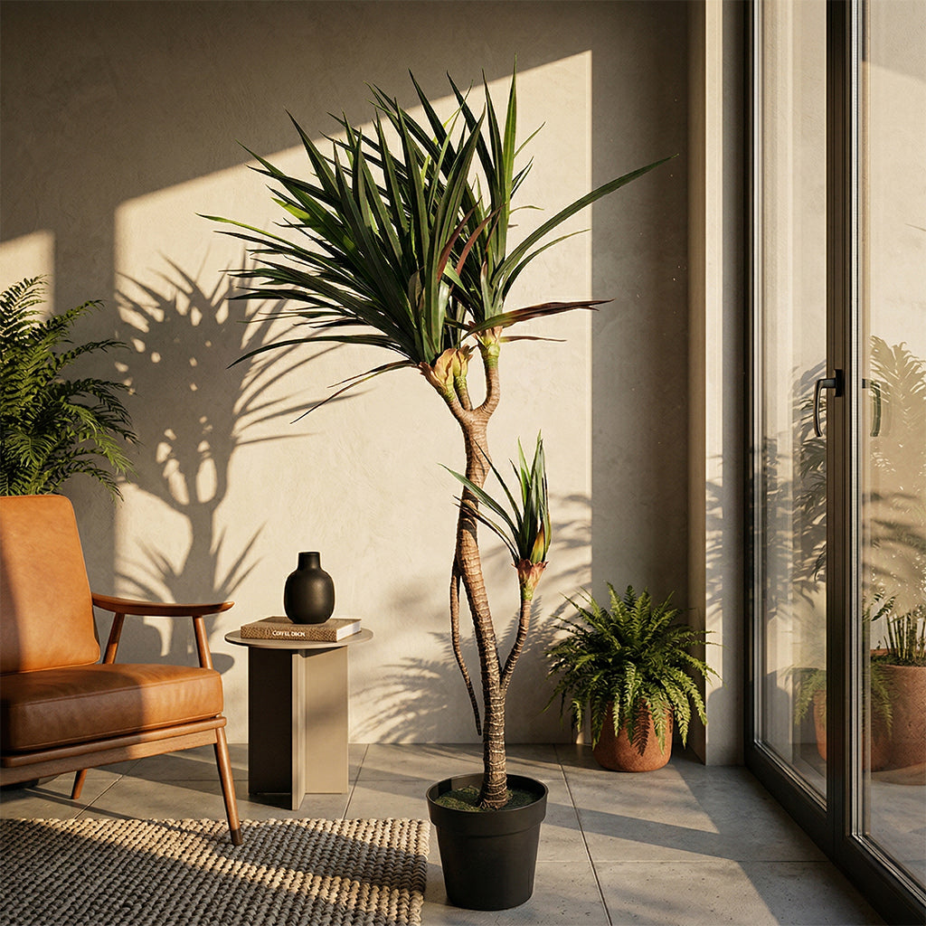 Artificial Dracaena Draco plant, 140cm tall, from BEACON, with long green leaves and realistic foliage.