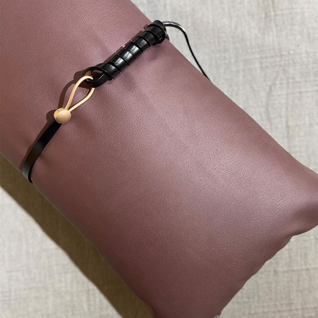 Beige 30x60 Cecil decorative sash cushion by Beacon, featuring elegant fabric and decorative sash design on a soft cushion.