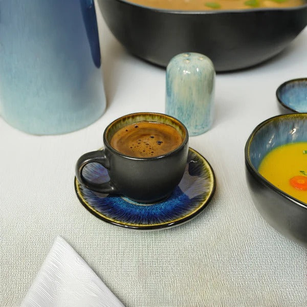 38-piece Blue Wave BEACON dinnerware set includes plates, bowls, and mugs with a blue wave design for stylish dining.