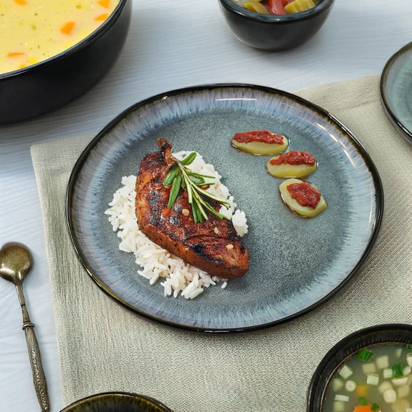 38-piece blue wave BEACON dinnerware set including plates, bowls, and cups for stylish dining.