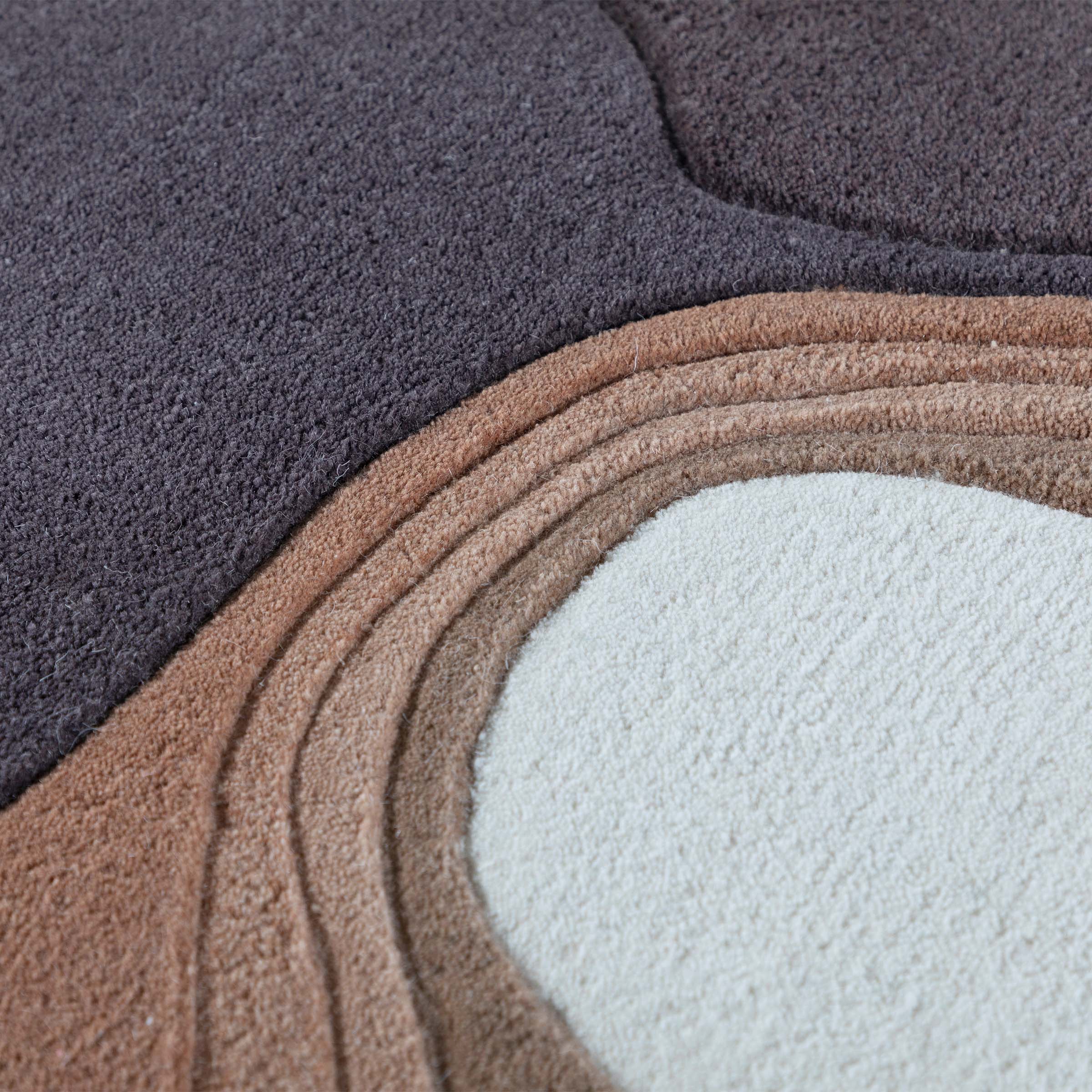 Large 450x300 cm Driftwood Melody wool rug in beige and dark beige, showcasing a textured, woven pattern from Javi.