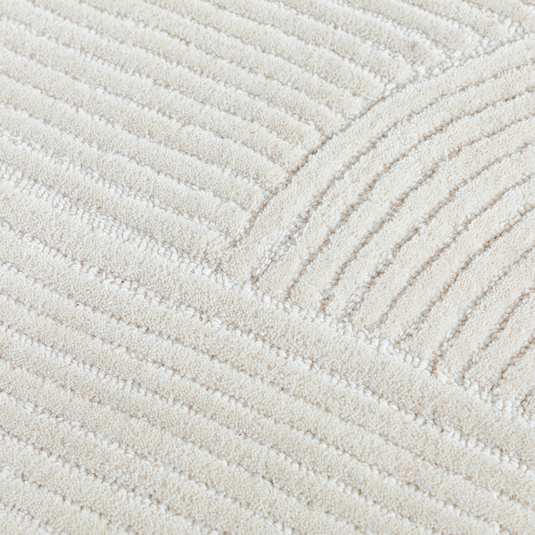 Beige wool rug measuring 450x300 cm from Javi, with a soft textured surface and elegant design for living spaces.