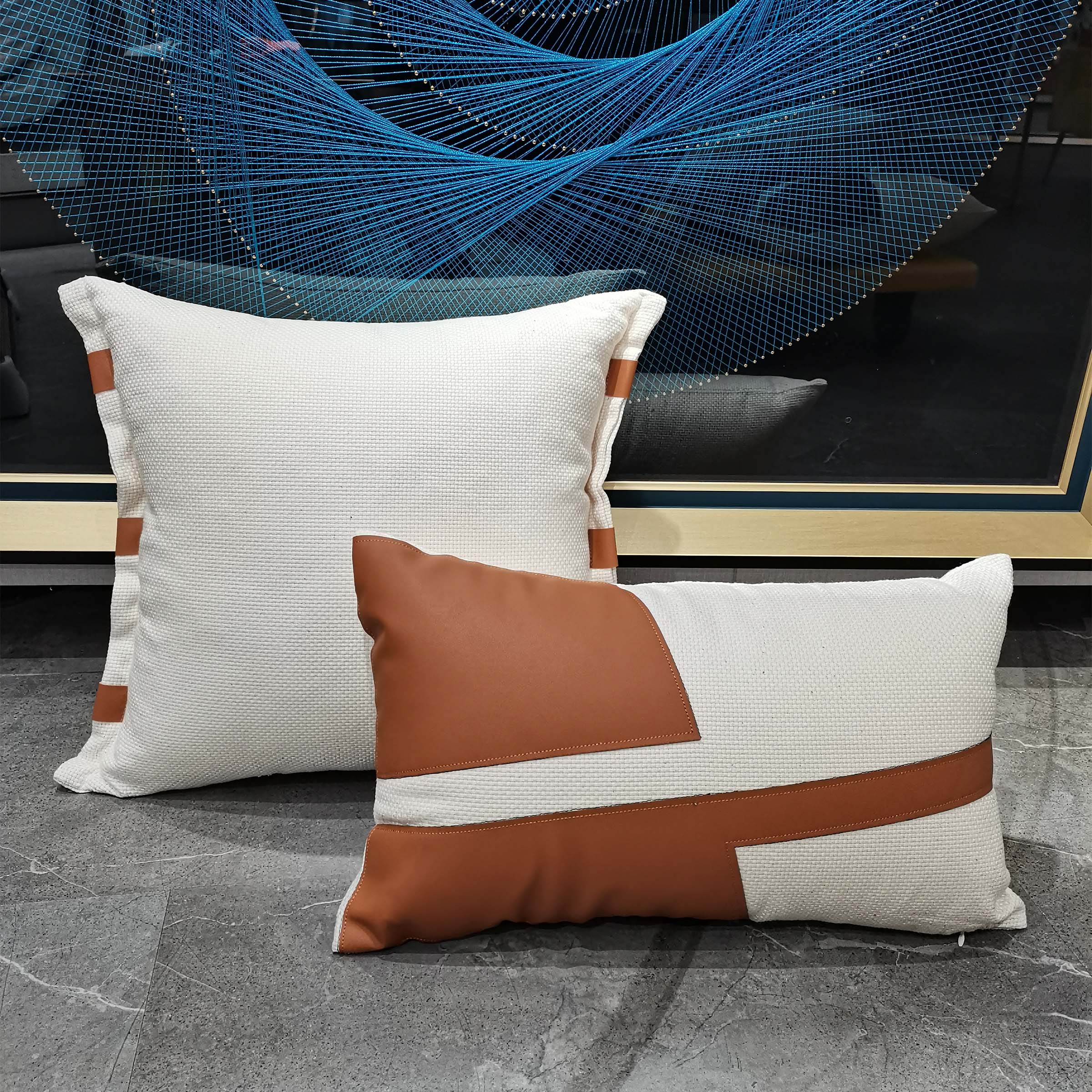 White edge leather cushion, 45x45 cm from BEACON, in white and caramel color, showcasing soft leather texture and stylish design.
