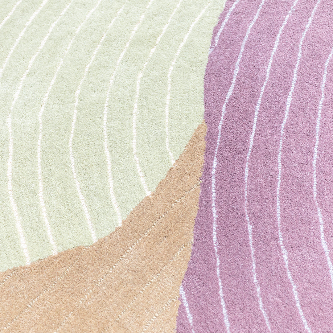 Large 500x500 cm wool rug in beige, brown, and pink by Javi, featuring a textured woven design.
