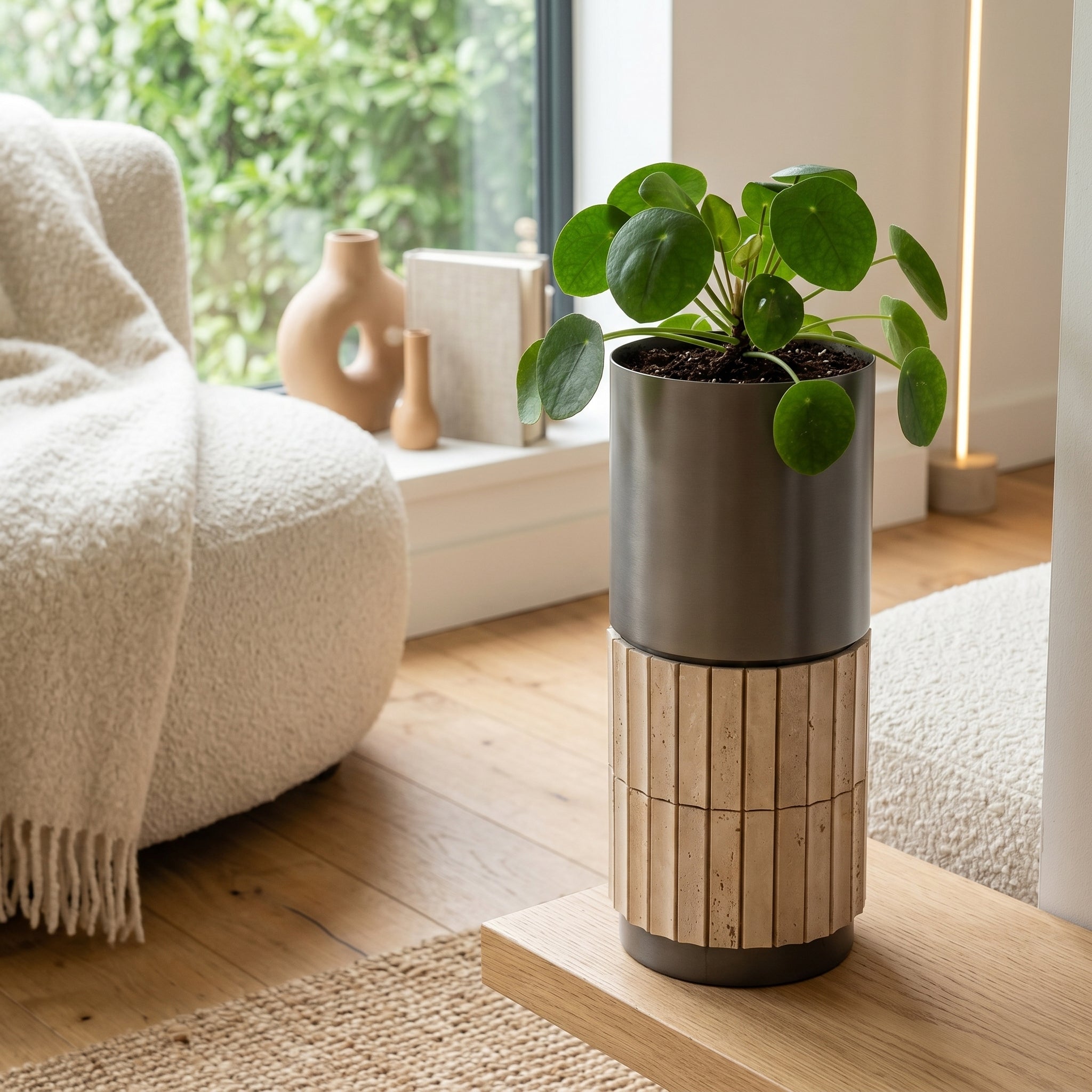 Urban Terra Cylinder Planter Box by ebarza, made of durable material, featuring a sleek cylindrical design for indoor or outdoor gardening.
