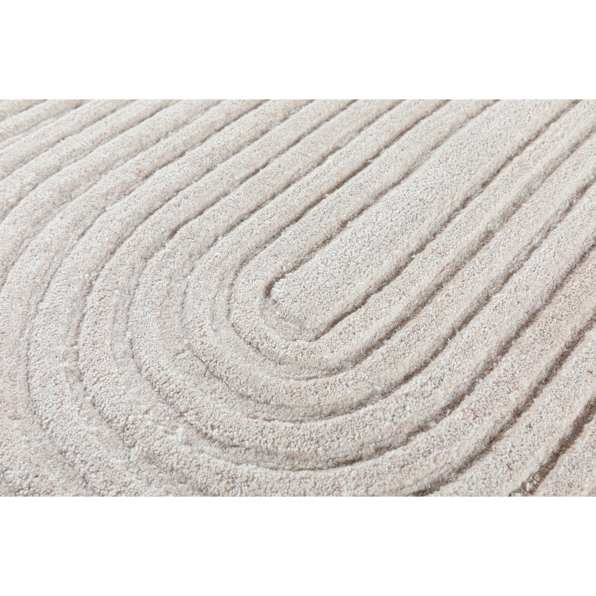 600x400 cm beige wool rug with eclipsed pearl pattern by Javi, featuring soft textures and elegant design.