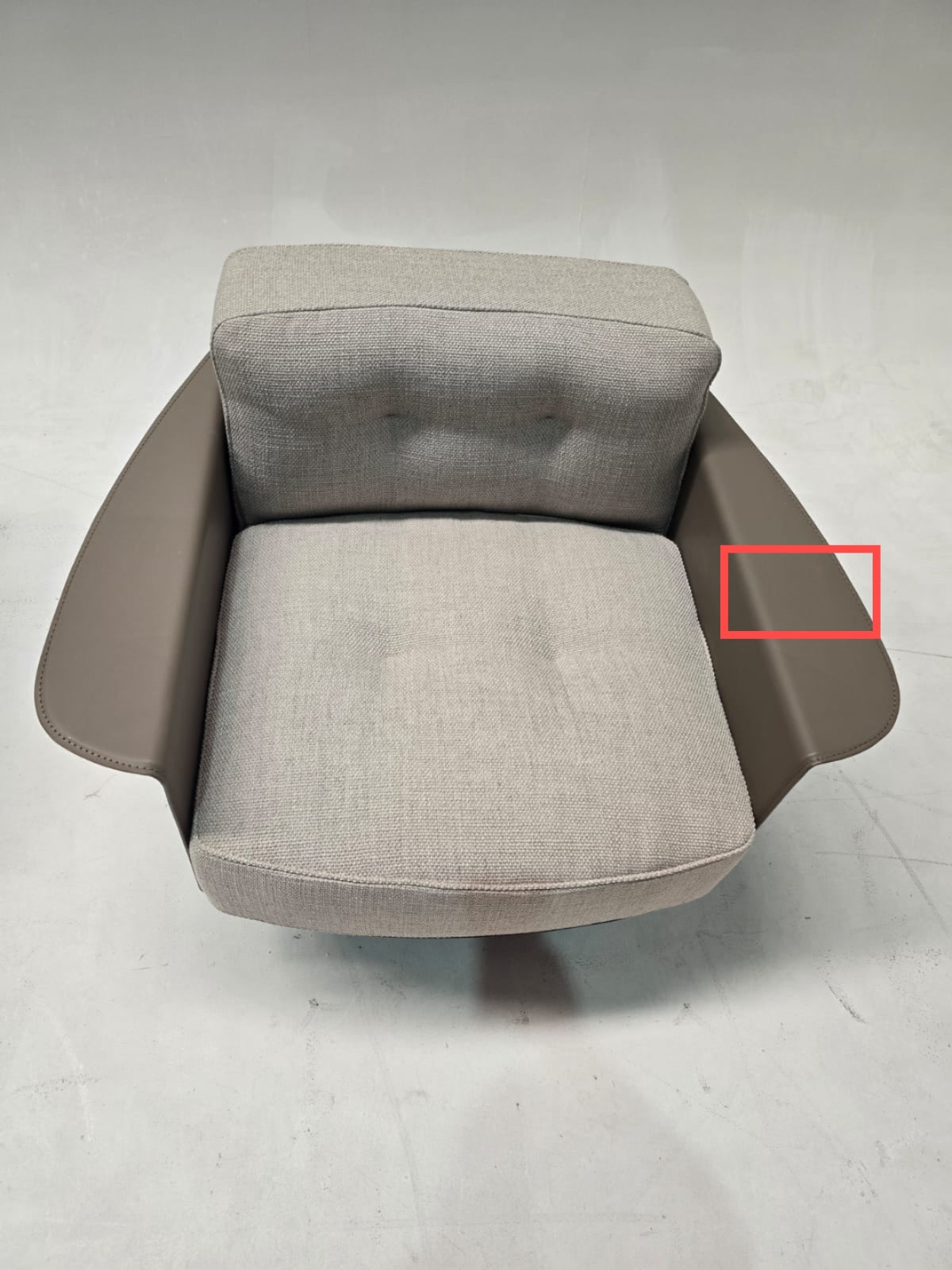 Display image of the Avenor armchair by Beacon, featuring a modern design with plush upholstery and a comfortable seating area.