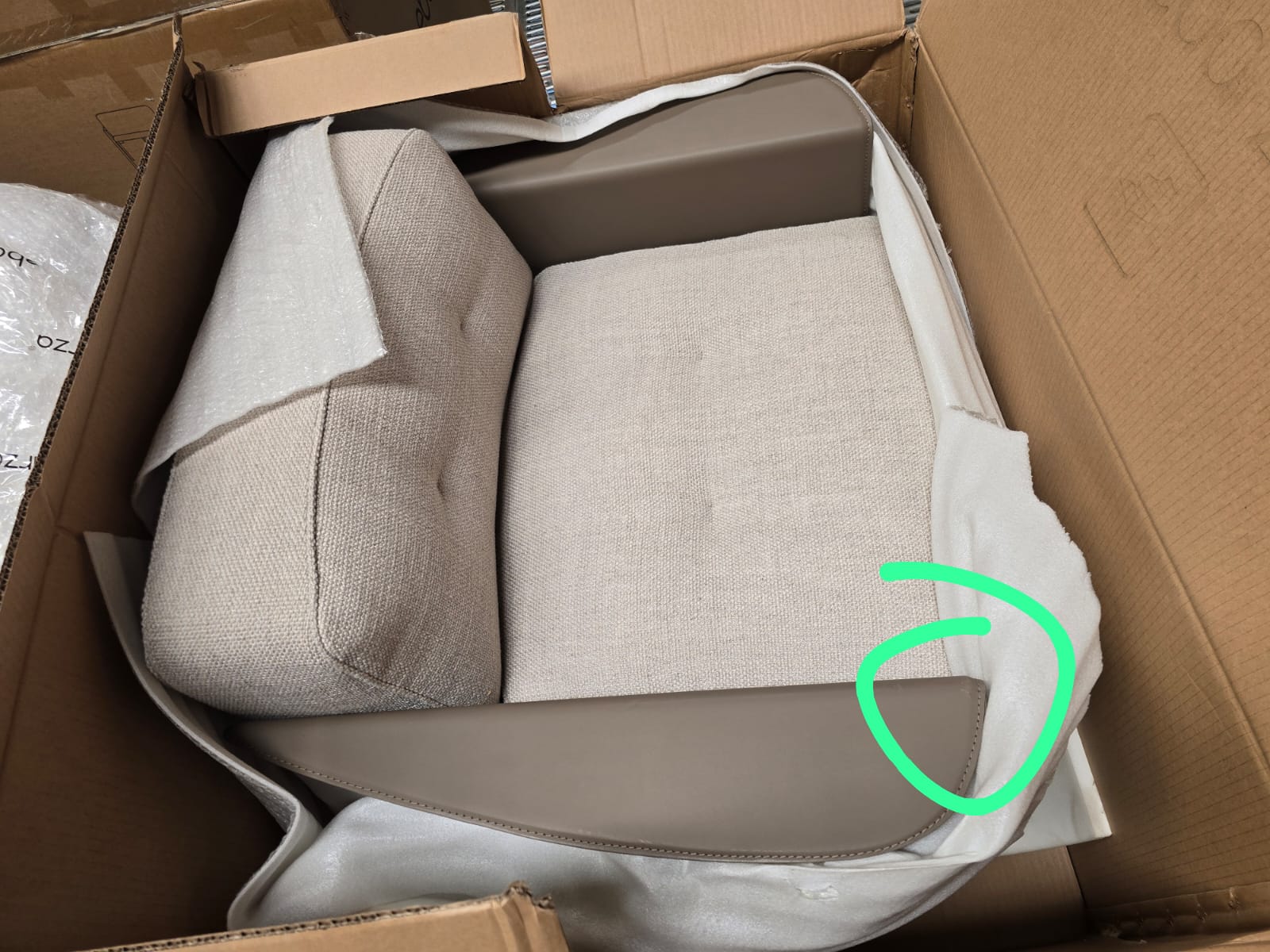 Display image of the Avenor armchair by Beacon, showcasing its fabric upholstery and modern design in a neutral setting.