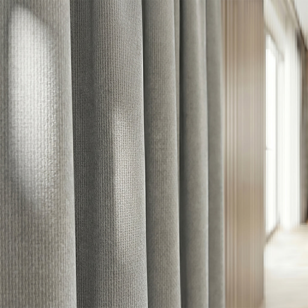 Beige polyester curtain fabric by BEACON, featuring a textured anvil pattern, ideal for curtains and drapes.