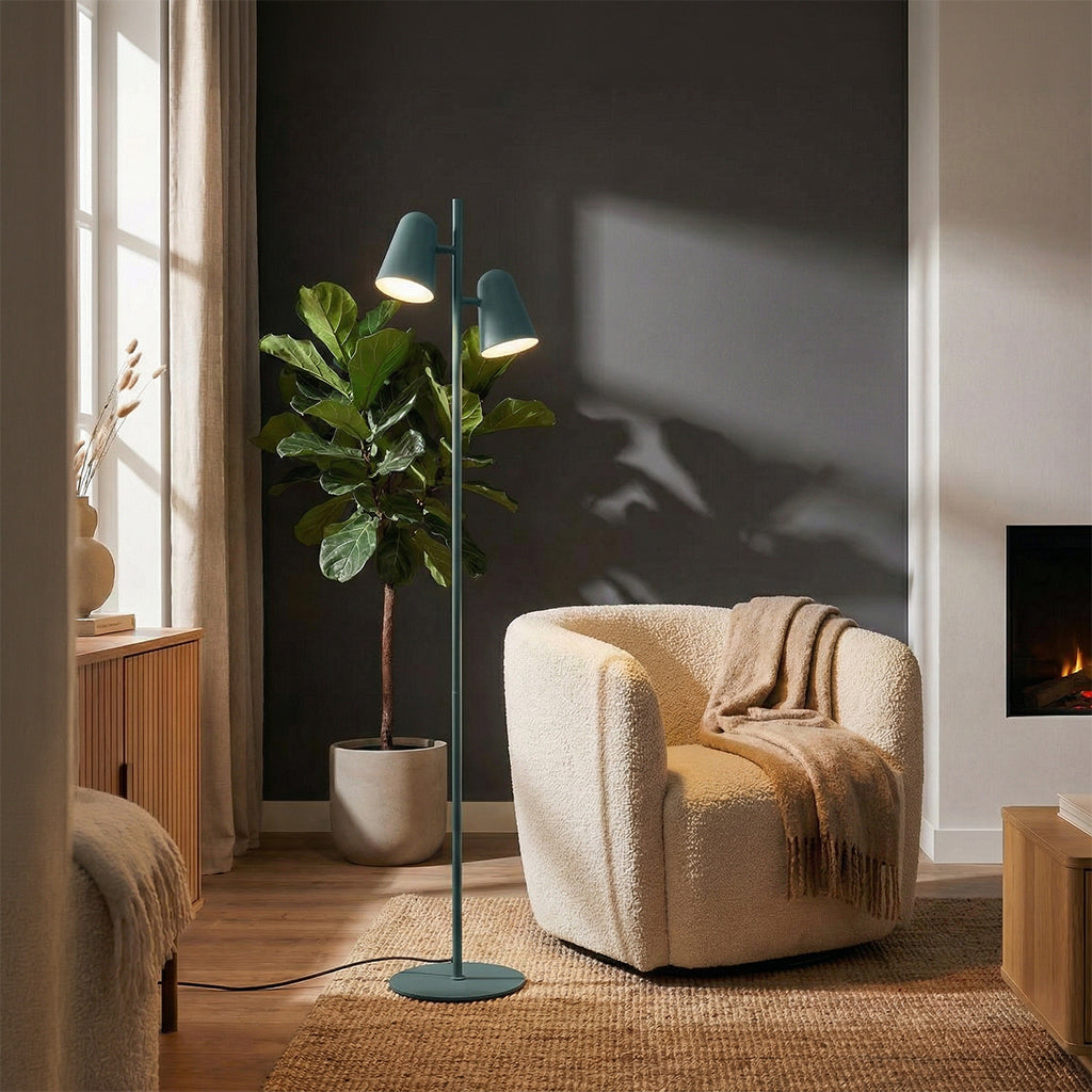 BEACON Arbor floor lamp with modern design, featuring a tall, sleek metal stand and adjustable arm for ambient lighting.