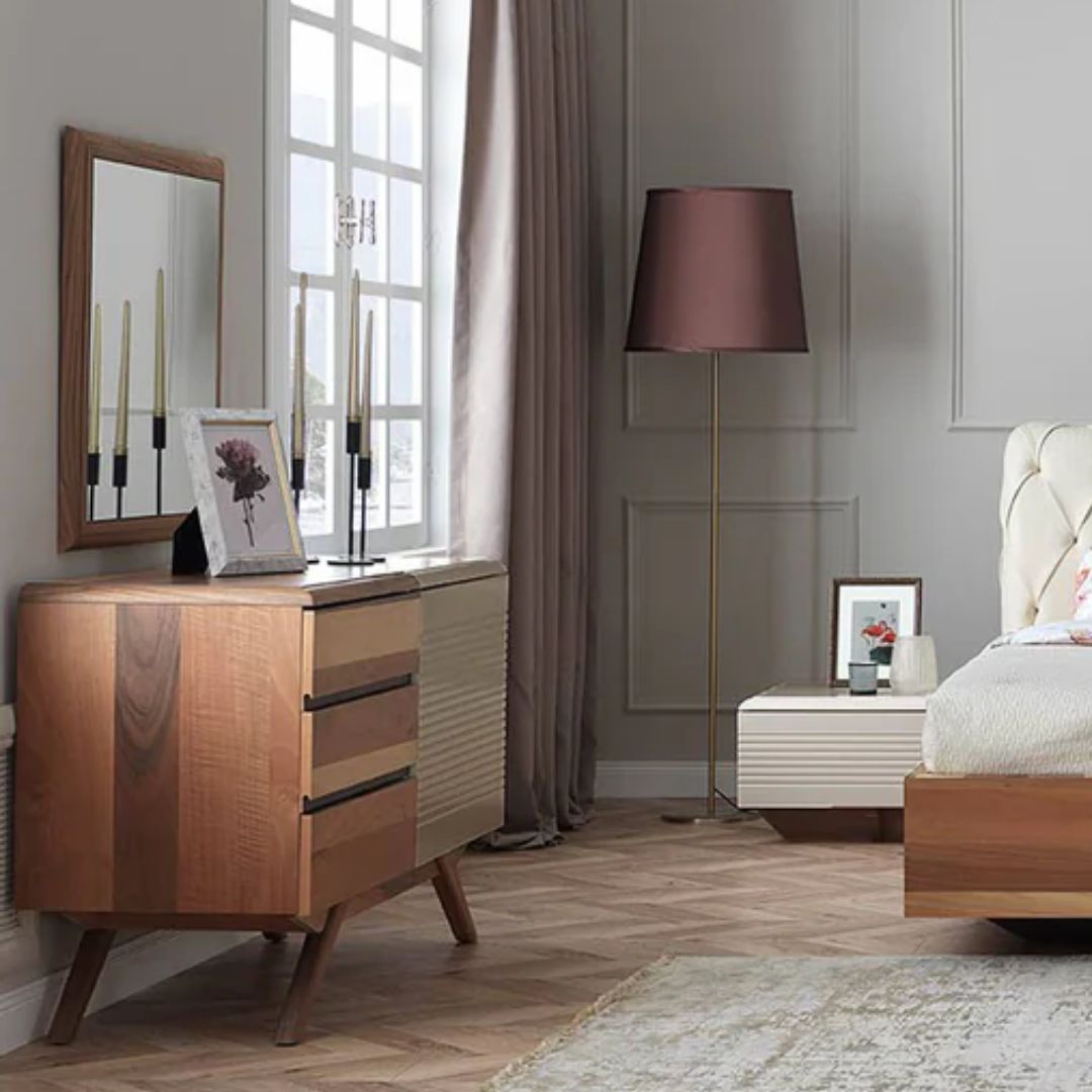 Square Arya Mirror 75x75 with a sleek frame by YOL LIVING, shown hanging on a wall in a modern interior setting.