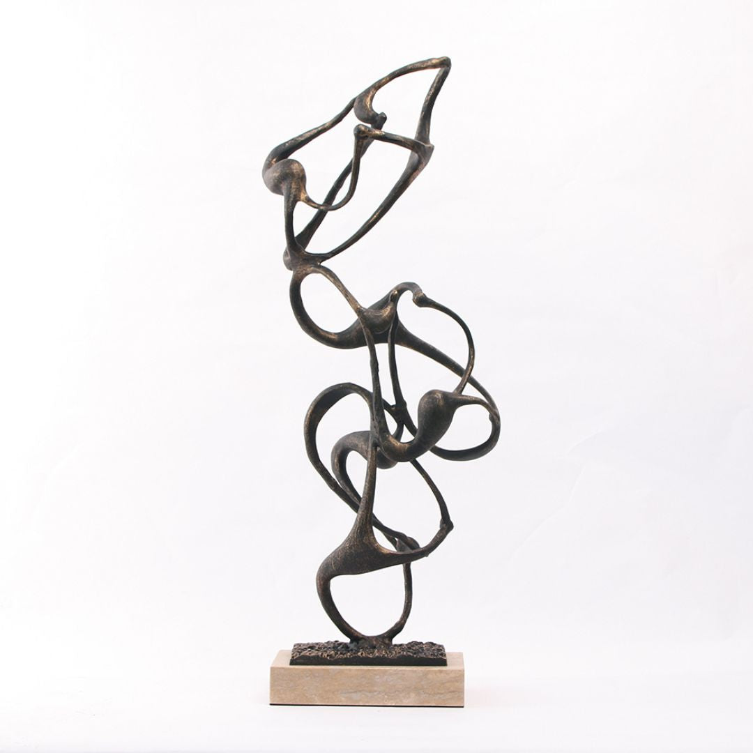 Balanced molecule sculpture home decor figurine by BEACON, featuring interconnected metal spheres and rods in a modern design.