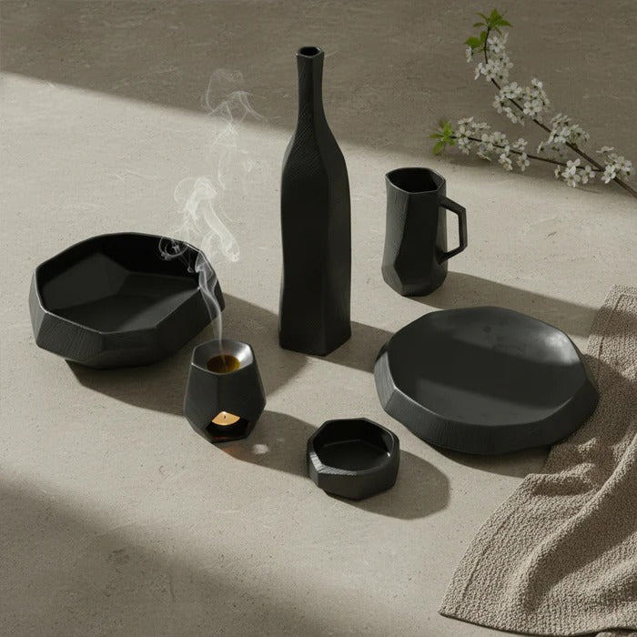 Black volcanic ceramic dinnerware set for two, Signature 10-piece dining set by MINGXIANG CERAMICS, includes dinner plates and bowls.