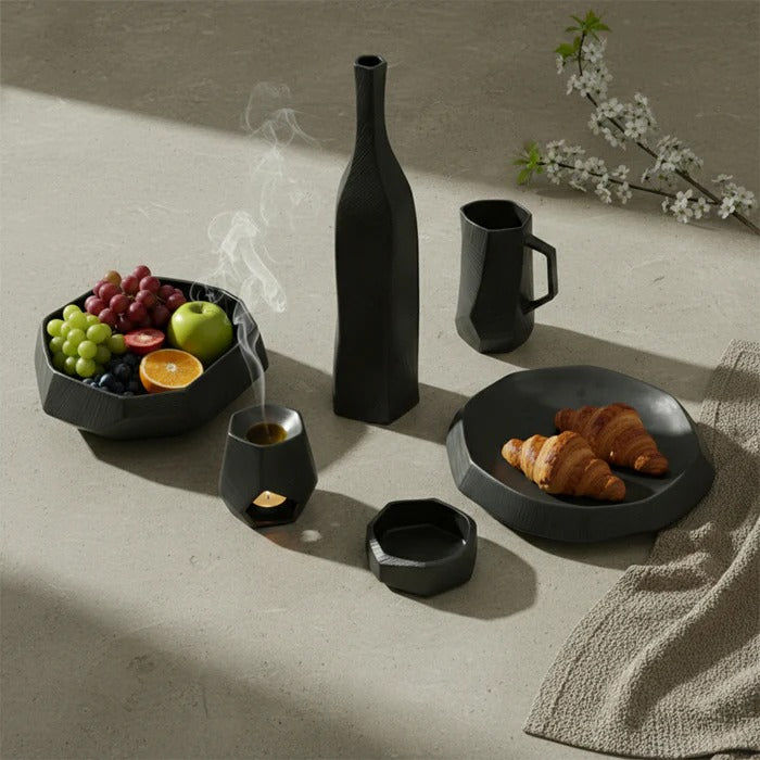 Black volcanic ceramic dinnerware set for two with 10 pieces, including plates and bowls from Mingxiang Ceramics.