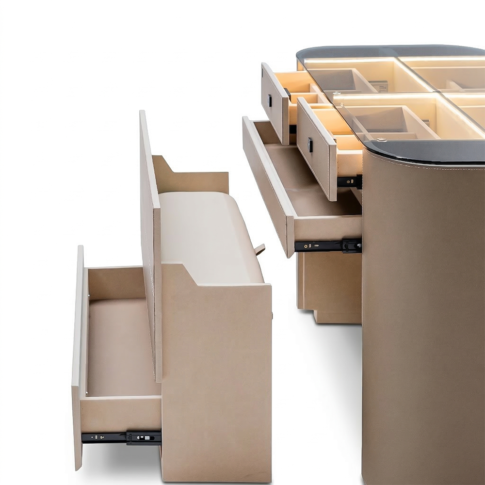 Valmont center island dresser with matching bench from Beacon, featuring sleek cabinet doors and a spacious surface for storage.