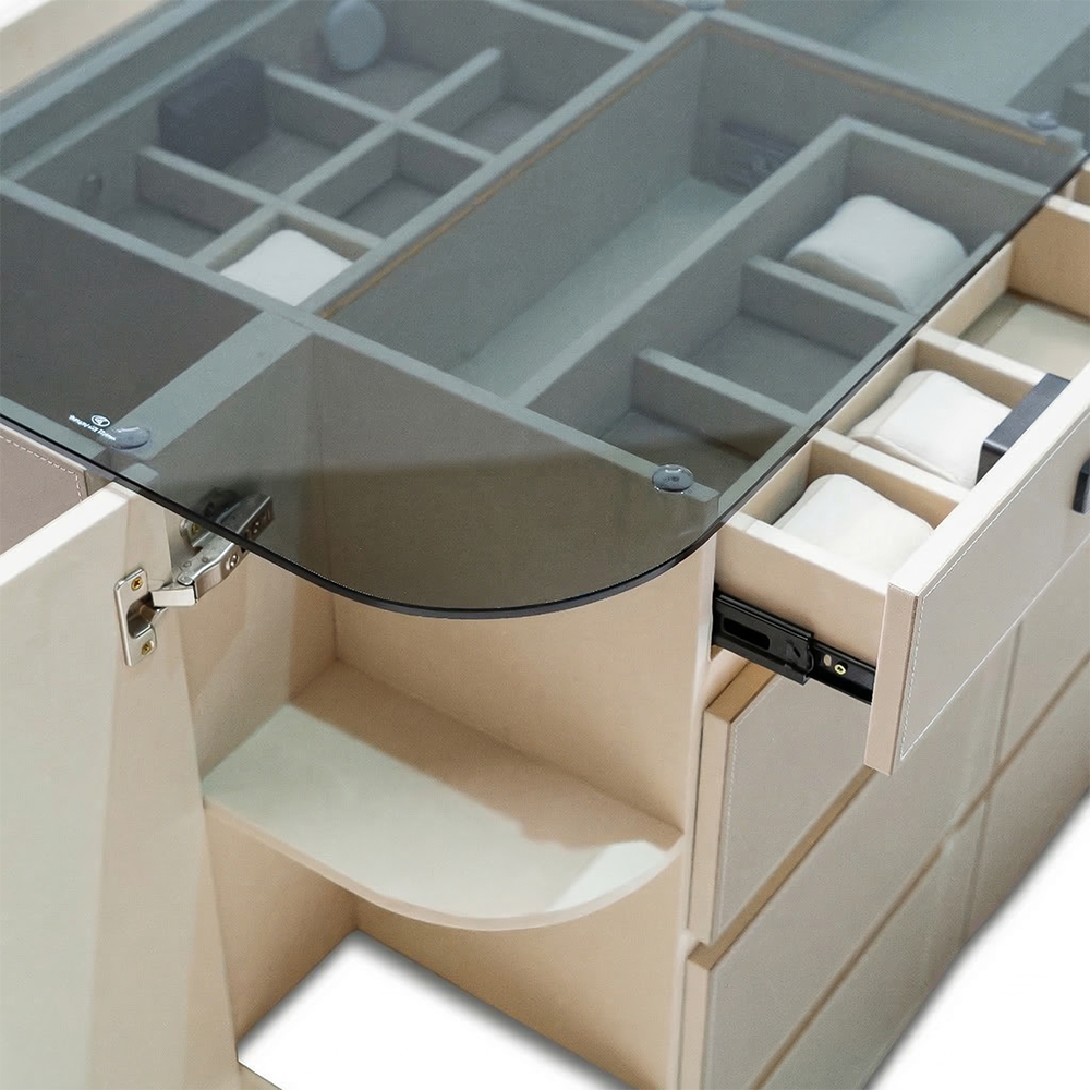 Valmont center island dresser with matching bench by BEACON, featuring sleek cabinet doors and a spacious tabletop.