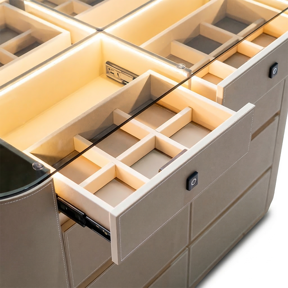 Valmont Center Island Dresser with Bench by BEACON, featuring modern cabinet design and a matching seating bench.